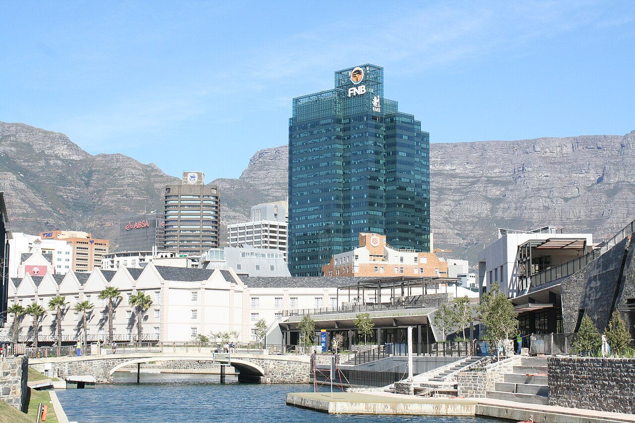 Cape Town's Waterfront buildings and water with Table Mountain rising behind the city