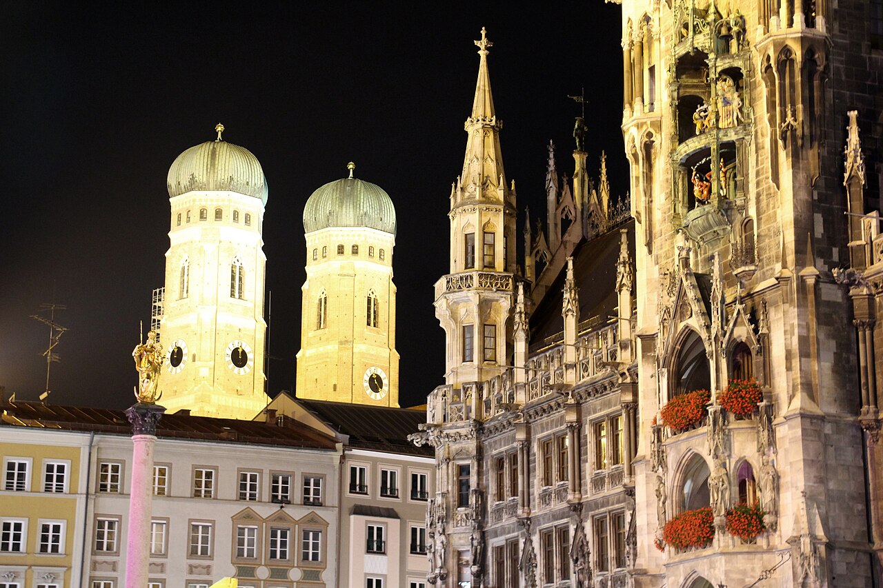 Illuminated buildings and ornate town-hall stonework at Munich's Marienplatz at night