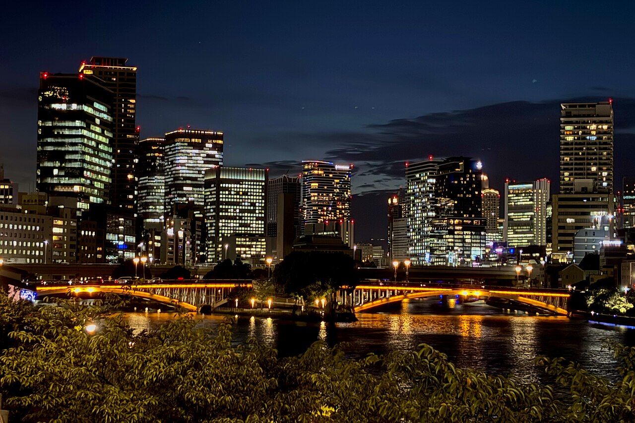 Nakanoshima river and illuminated Osaka buildings after dark
